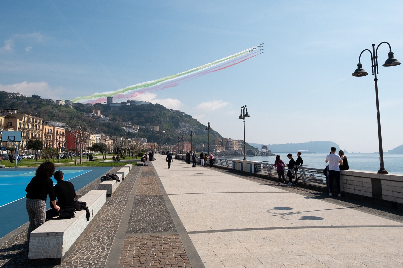 Italian Air Force's aerobatic demonstration team Frecce Tricolori performs as they pass over the Air Force Academy during the Oath and Baptism ceremony of the students of the 1st class of the Institute's Regular Courses, Course Eolo VI, in Pozzuoli on March 21, 2024.,Image: 858490877, License: Rights-managed, Restrictions: , Model Release: no, Credit line: Eliano Imperato / AFP / Profimedia