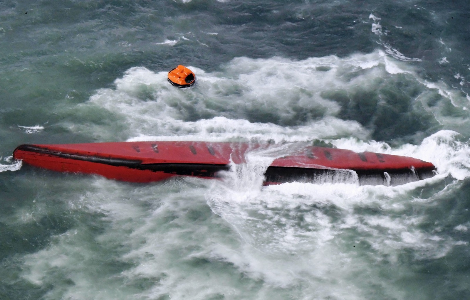 Photo taken on March 20, 2024, from a Kyodo News helicopter shows a capsized South Korean chemical tanker off the western Japan city of Shimonoseki, Yamaguchi Prefecture. The incident involving the 870-ton Keoyoung Sun occurred earlier in the day, leaving five of 11 crew on board missing, while the conditions of the six who were rescued remain unknown.,Image: 858180928, License: Rights-managed, Restrictions: , Model Release: no, Credit line: Kyodo/Newscom / Newscom / Profimedia