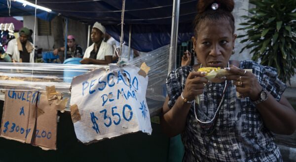 Food vendors participate in the city carnival celebrating the 70th anniversary of the failed attack on the Moncada barracks by a small group of revolutionaries led by Fidel Castro that marked the beginning of the Cuban revolution, in Santiago de Cuba, July 26, 2023.,Image: 792269359, License: Rights-managed, Restrictions: , Model Release: no, Credit line: Yamil LAGE / AFP / Profimedia