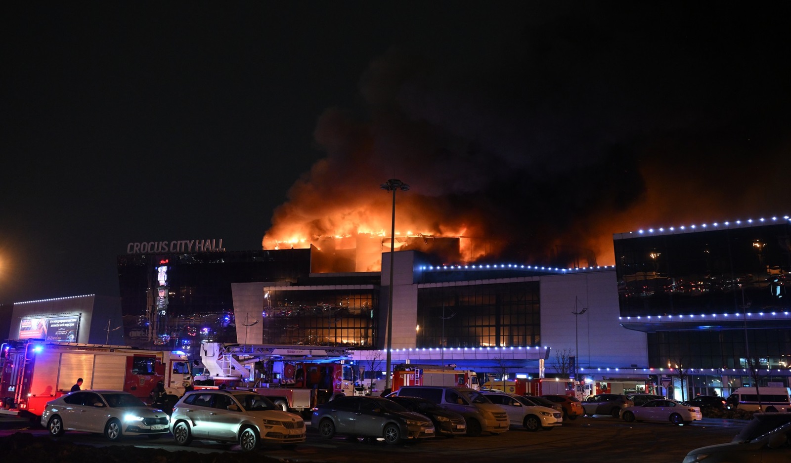 8647689 22.03.2024 Smoke rises above the Crocus City Hall concert venue following a reported shooting incident, near Moscow, Russia. Several gunmen in combat fatigues burst into a concert hall on March 22 and fired automatic weapons at the crowd, injuring an unspecified number of people.,Image: 858839271, License: Rights-managed, Restrictions: Editors' note: THIS IMAGE IS PROVIDED BY RUSSIAN STATE-OWNED AGENCY SPUTNIK., Model Release: no, Credit line: Maksim Blinov / Sputnik / Profimedia