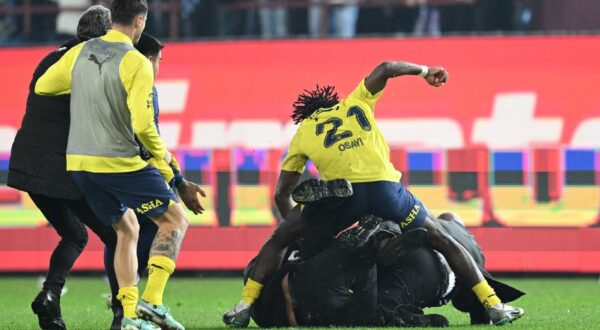 TRABZON, TURKIYE - MARCH 17: Osayi (21) of Fenerbahce gets a fight with a supporter after the Turkish Super Lig week 30 football match between Trabzonspor and Fenerbahce at Papara Park in Trabzon, Turkiye on March 17, 2024. Hakan Burak Altunoz / Anadolu,Image: 857622555, License: Rights-managed, Restrictions: , Model Release: no, Credit line: AA/ABACA / Abaca Press / Profimedia