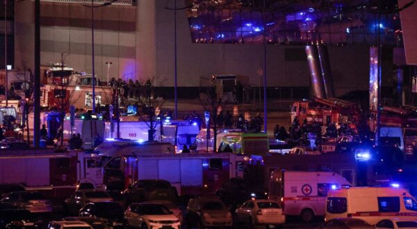 RUSSIA, MOSCOW REGION - MARCH 22, 2024: First respoders are seen outside the Crocus City Hall in the town of Krasnogorsk where unidentified persons opened fire. Evacuation is underway. Mikhail Tereshchenko/TASS