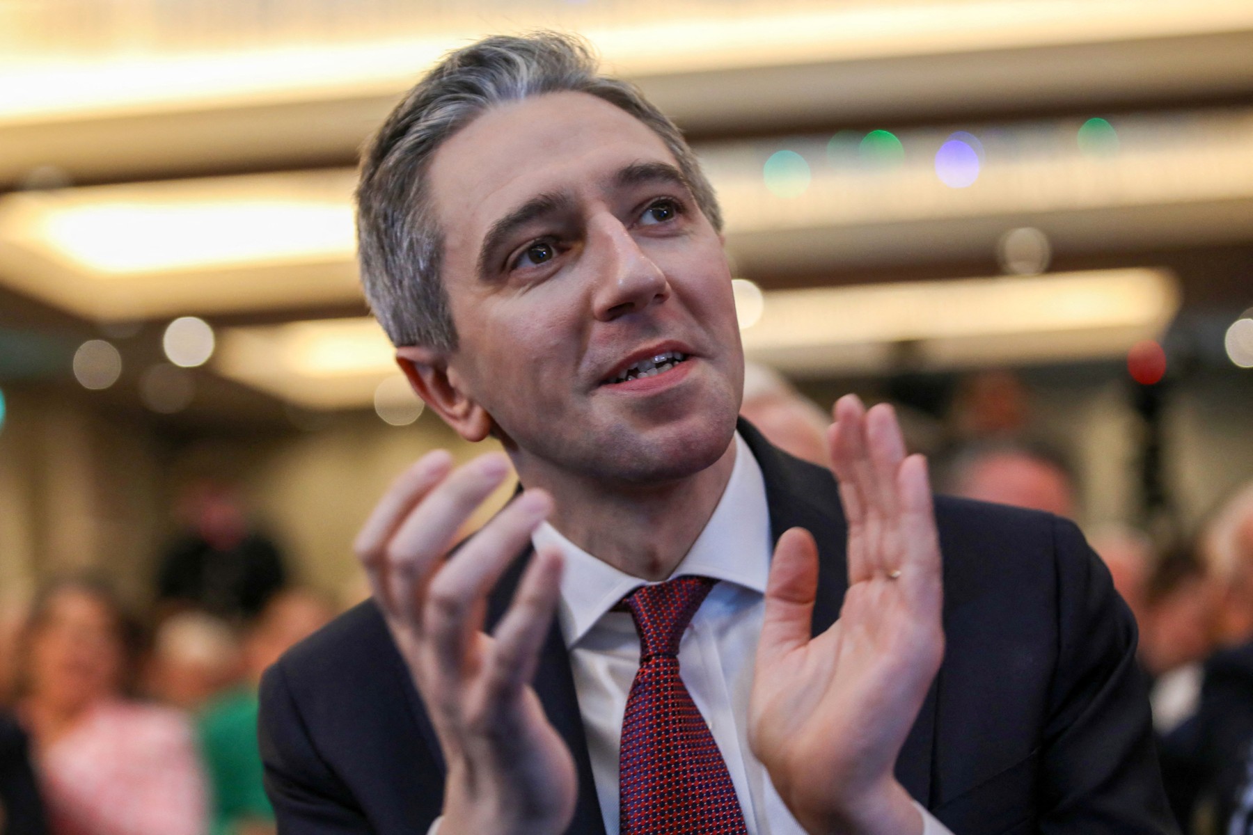 Simon Harris applauds during the Fine Gael convention at the Sheraton Hotel in Athlone, central Ireland on March 24, 2024, before being declared leader and de facto prime minister-in-waiting. Irish prime minister-in-waiting Simon Harris' takes over following the shock resignation of predecessor Leo Varadkar on Wednesday, a move pundits described as a "political earthquake" in the EU member.,Image: 859252255, License: Rights-managed, Restrictions: , Model Release: no, Credit line: Paul Faith / AFP / Profimedia