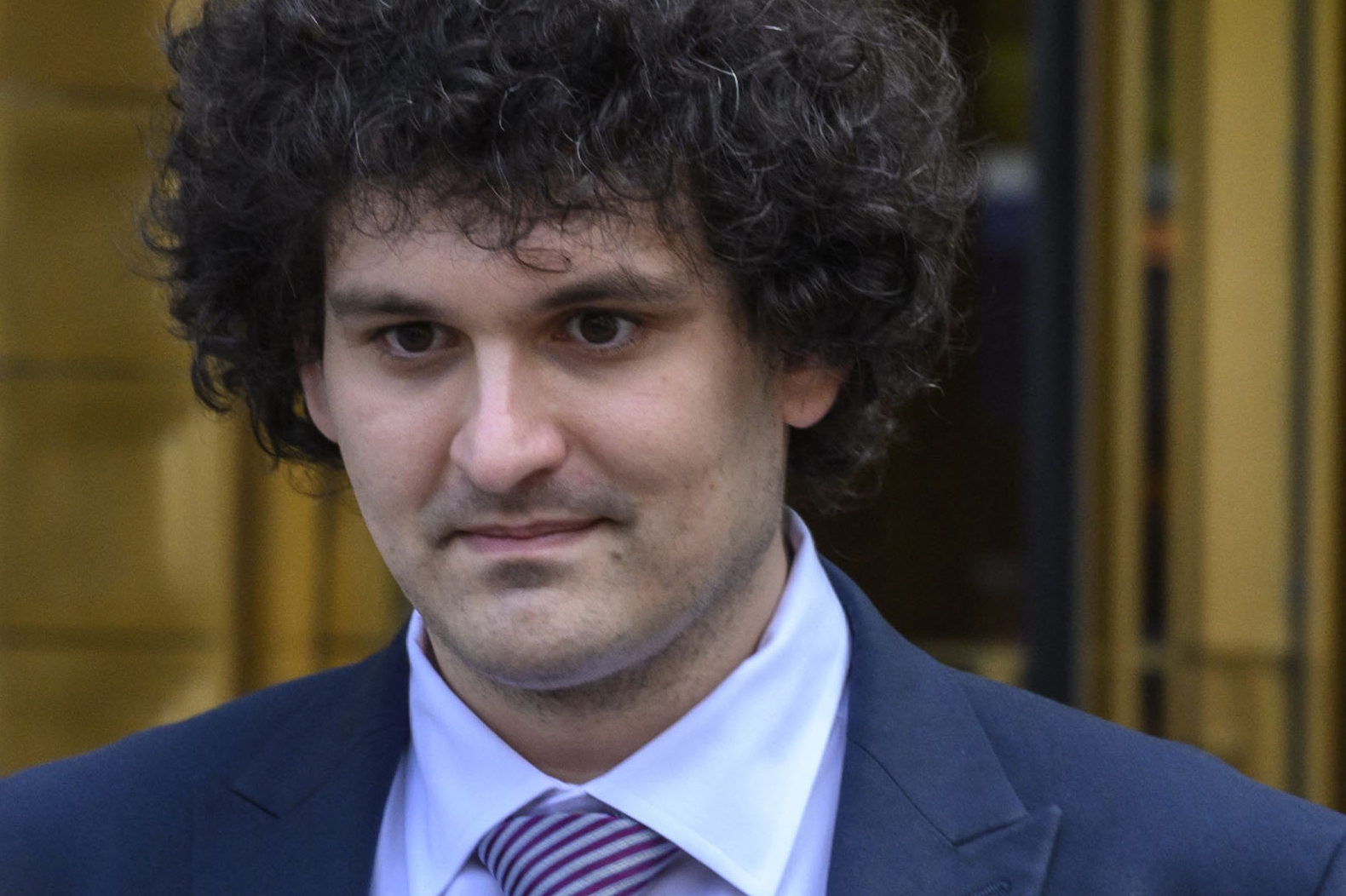 (FILES) FTX's former CEO and founder Sam Bankman-Fried leaves the Federal Courthouse following a bail hearing ahead of his October trial, in New York City on July 26, 2023.   Disgraced cryptocurrency wunderkind Bankman-Fried was sentenced to 25 years in jail on March 28, 2024, following his conviction in one of the biggest financial fraud cases in history.,Image: 860471922, License: Rights-managed, Restrictions: , Model Release: no, Credit line: ANGELA WEISS / AFP / Profimedia