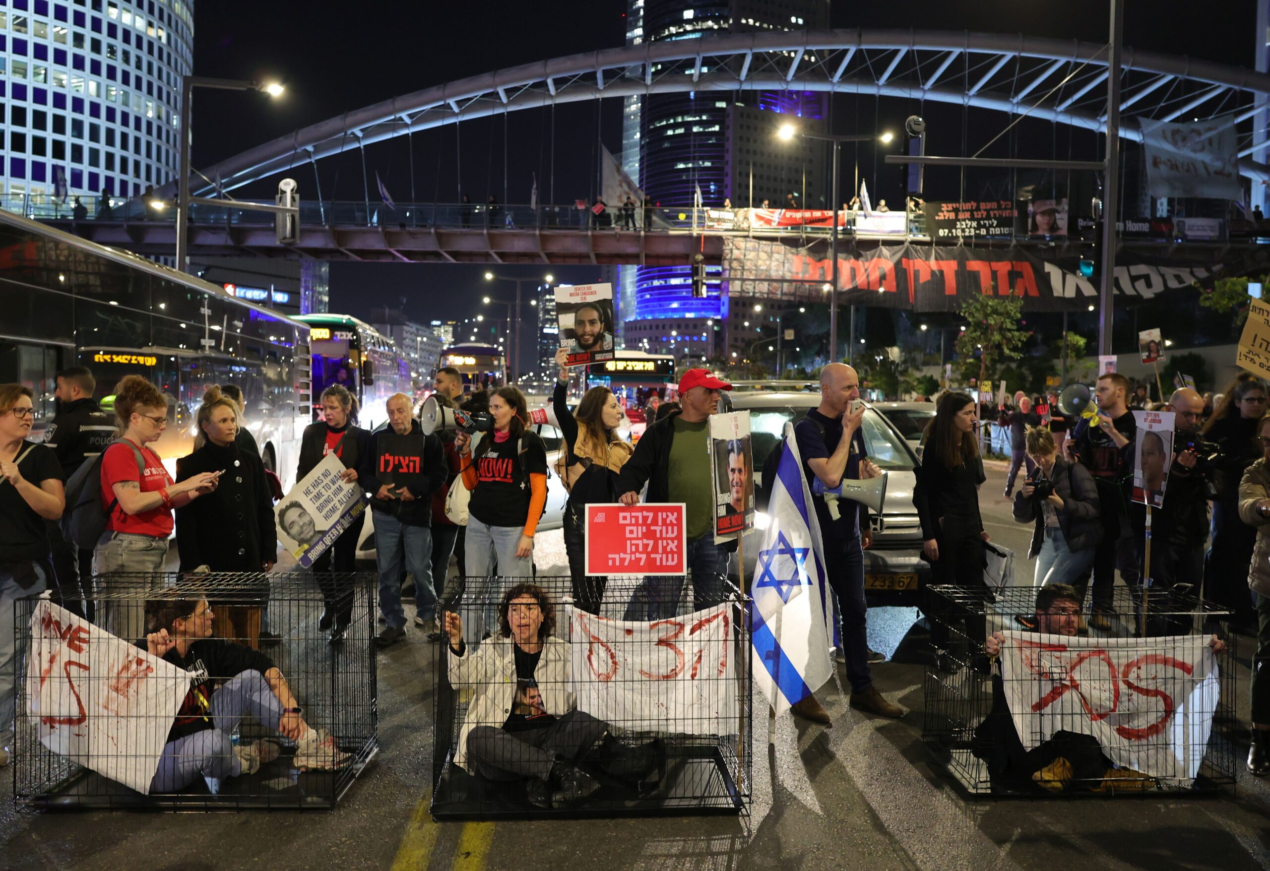 epa11245002 Family members and supporters of Israeli hostages held by Hamas in Gaza protest outside the Kirya military headquarters in Tel Aviv, Israel, 26 March 2024. According to the Israeli IDF, 134 Israeli hostages are currently being held by Hamas in Gaza. Israel has recalled its negotiating team from Qatar, ending immediate attempts to negotiate a ceasefire and hostage release deal with Hamas, Prime Minister Benjamin Netanyahu's office said in a statement.  EPA/ABIR SULTAN