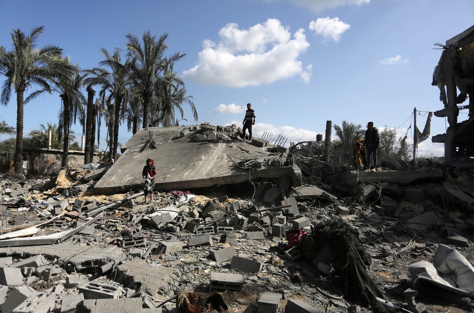 DEIR AL-BALAH, GAZA - MARCH 10: Palestinians inspect the damage of demolished building, belonged to Palestinian Musa family, following the Israeli attacks in Deir al-Balah, Gaza on March 10, 2024. It was reported that there were dead and wounded as a result of the attack. Ashraf Amra / Anadolu,Image: 855542493, License: Rights-managed, Restrictions: , Model Release: no, Credit line: AA/ABACA / Abaca Press / Profimedia