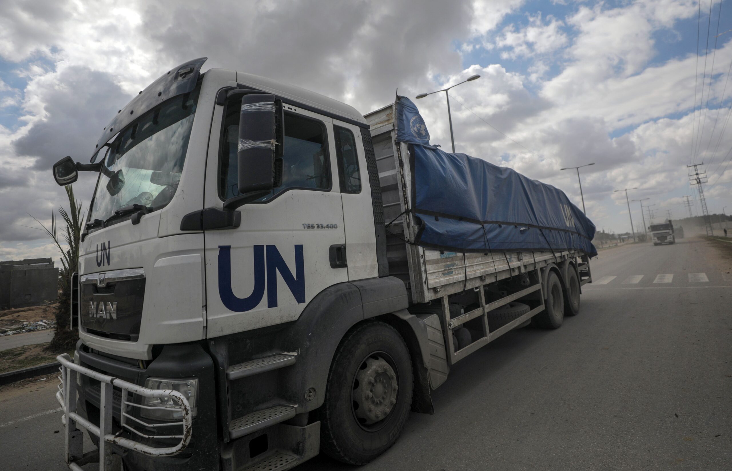 epa11207281 Trucks carrying aid to Gaza residents cross from Rafah border to Deir Al Balah town, southern Gaza Strip, 08 March 2024. Since 07 October 2023, up to 1.9 million people, or more than 85 percent of the population, have been displaced throughout the Gaza Strip, some more than once, according to the United Nations Relief and Works Agency for Palestine Refugees in the Near East (UNRWA), which added that most civilians in Gaza are in 'desperate need of humanitarian assistance and protection'. The international community is combining efforts to increase humanitarian assistance to the residents of Gaza affected by the ongoing conflict.  EPA/MOHAMMED SABER