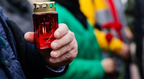 8648782 23.03.2024 A man holds a lit candle at a makeshift memorial in Victory Square to commemorate the victims of a terrorist attack on the Crocus City Hall concert venue just outside Moscow, in Ivanovo, Russia.,Image: 859018345, License: Rights-managed, Restrictions: Editors' note: THIS IMAGE IS PROVIDED BY RUSSIAN STATE-OWNED AGENCY SPUTNIK., Model Release: no, Credit line: Varvara Gertye / Sputnik / Profimedia