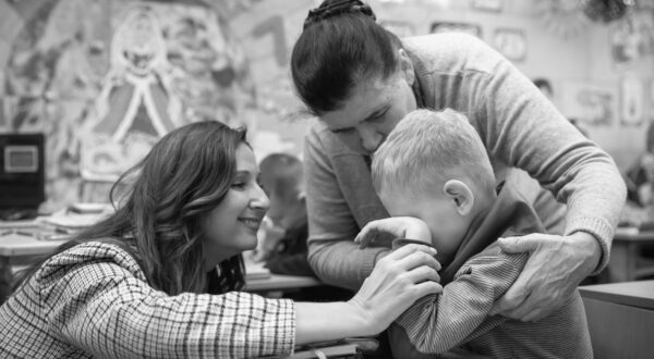 Two teachers calm a distraught boy from the primary section during class. Ukrainian children attend classes at a school in a metro station in Kharkiv, Ukraine, amid the Russian invasion. Many children in Kharkiv don’t go to schools as their parents fear for their safety due to the city’s proximity to the Russian border. The City authorities organized the education process for children in the underground school classes in the city's metro.,Image: 852184407, License: Rights-managed, Restrictions: *** World Rights ***, Model Release: no, Credit line: SOPA Images / ddp USA / Profimedia