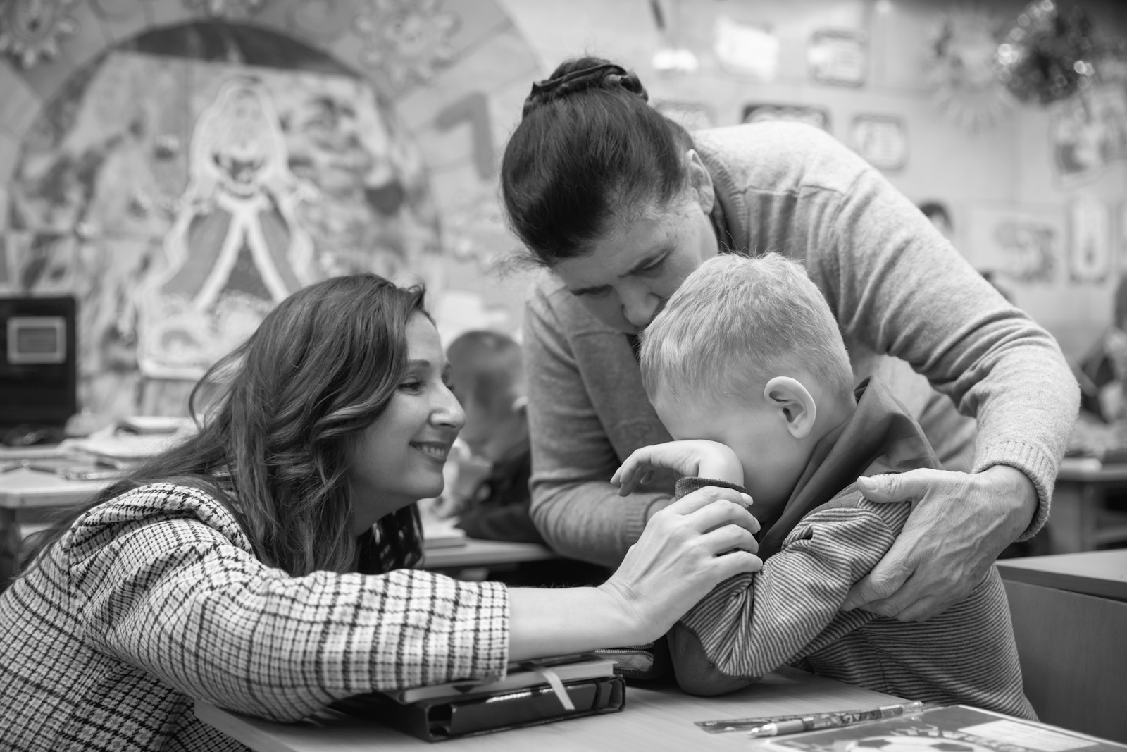 Two teachers calm a distraught boy from the primary section during class. Ukrainian children attend classes at a school in a metro station in Kharkiv, Ukraine, amid the Russian invasion. Many children in Kharkiv don’t go to schools as their parents fear for their safety due to the city’s proximity to the Russian border. The City authorities organized the education process for children in the underground school classes in the city's metro.,Image: 852184407, License: Rights-managed, Restrictions: *** World Rights ***, Model Release: no, Credit line: SOPA Images / ddp USA / Profimedia