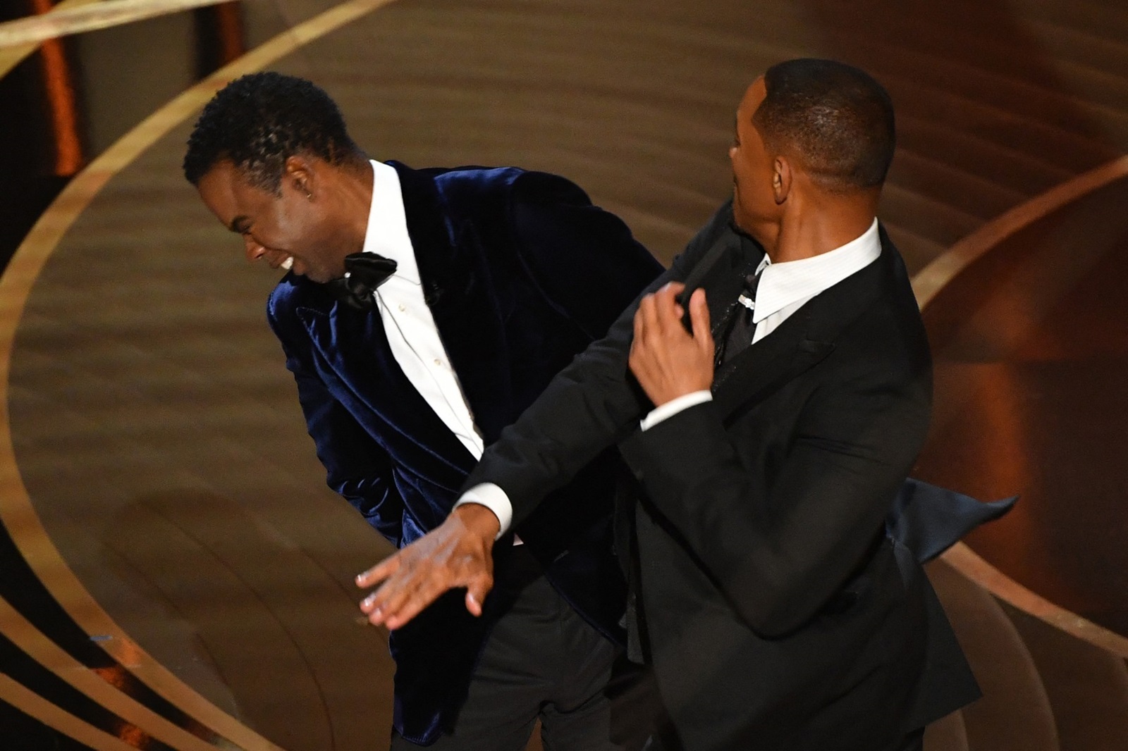 US actor Will Smith (R) slaps US actor Chris Rock onstage during the 94th Oscars at the Dolby Theatre in Hollywood, California on March 27, 2022.,Image: 673498822, License: Rights-managed, Restrictions: , Model Release: no, Credit line: Robyn Beck / AFP / Profimedia