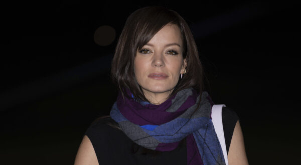 Lily Allen poses for photographers upon arrival at the Burberry Winter 2024 fashion show on Monday, Feb. 19, 2024 in London. (Photo by Vianney Le Caer/Invision/AP)