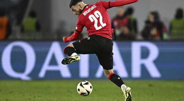 Georgia's Georges Mikautadze controls the ball during the Euro 2024 qualifying play-off soccer match between Georgia and Greece at the Boris Paichadze National Stadium in Tbilisi, Georgia, Tuesday, March 26, 2024. (AP Photo/Tamuna Kulumbegashvili)