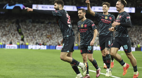April 9, 2024, Madrid: Madrid, Spain, 9th April 2024. JoÅ¡ko Gvardiol of Manchester City (L) celebrates after scoring his teams third goal during the UEFA Champions League match at the Santiago Bernabau, Madrid. (Credit Image: Â© Paul Terry/Sportimage/Cal Sport Media) (Cal Sport Media via AP Images)