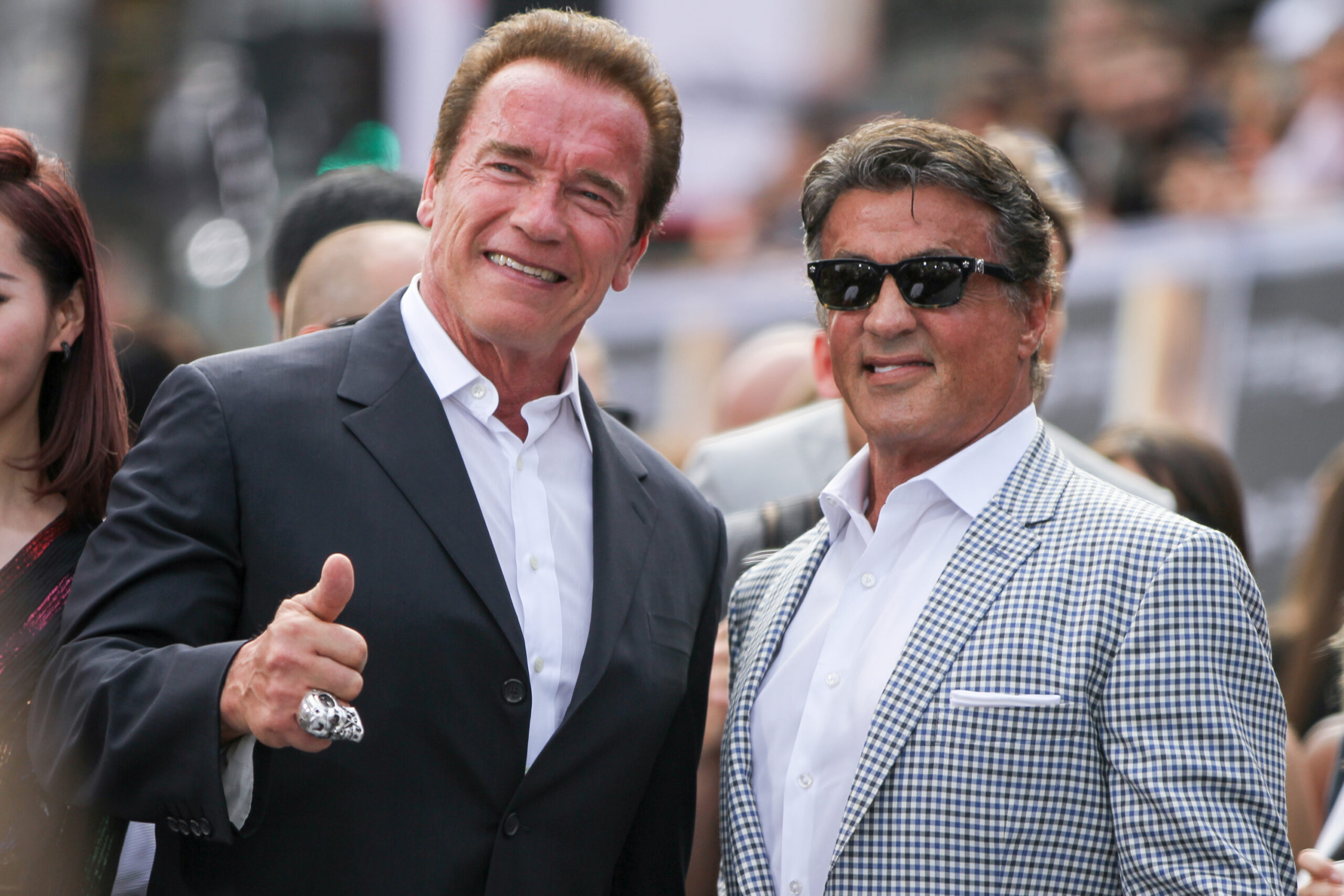 Arnold Schwarzenegger, left, and Sylvester Stallone arrives at the LA Premiere of "Terminator Genisys" at the Dolby Theatre on Sunday, June 28, 2015, in Los Angeles. (Photo by Rich Fury/Invision/AP)