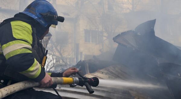 epa11264341 Ukrainian rescue services work at the site of a rocket attack on a residential area in Kharkiv, northeastern Ukraine, 07 April 2024, amid the Russian invasion. At least four people were wounded in the rocket attack, according to a report by the State Emergency Service. Russian troops entered Ukrainian territory on 24 February 2022, starting a conflict that has provoked destruction and a humanitarian crisis.  EPA/SERGEY KOZLOV 48947