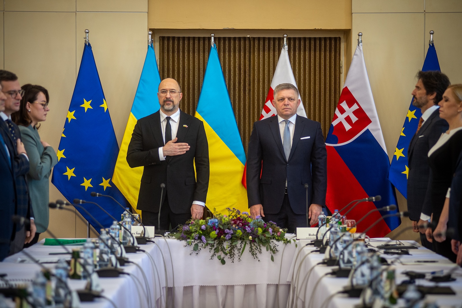 epa11271913 Ukrainian Prime Minister Denys Shmyhal (L) and Slovak Prime Minister Robert Fico (R) attend an intergovernmental meeting of Slovakia's and Ukraine's governments in Michalovce, Slovakia, 11 April 2024. They will discuss cross-border cooperation projects, transport links and energy cooperation. The ministers will also discuss the defence industry, cooperation in demining Ukrainian territories and logistical support. The reconstruction of Ukraine will also be one of the main topics of the meeting.  EPA/PETER LAZAR