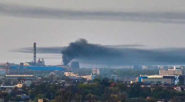 epa11271839 A cloud of smoke rises above a site following a rocket attack in Kharkiv, northeastern Ukraine, 11 April 2024, amid the Russian invasion. According to the Air Force Command of the Armed Forces of Ukraine, some 42 Russian rockets of different classes and 40 shock drones where launched on Kharkiv early 11 April 2024, with 18 rockets and 39 shock drones among them intercepted.  Russian troops entered Ukrainian territory on 24 February 2022, starting a conflict that has provoked destruction and a humanitarian crisis.  EPA/SERGEY KOZLOV