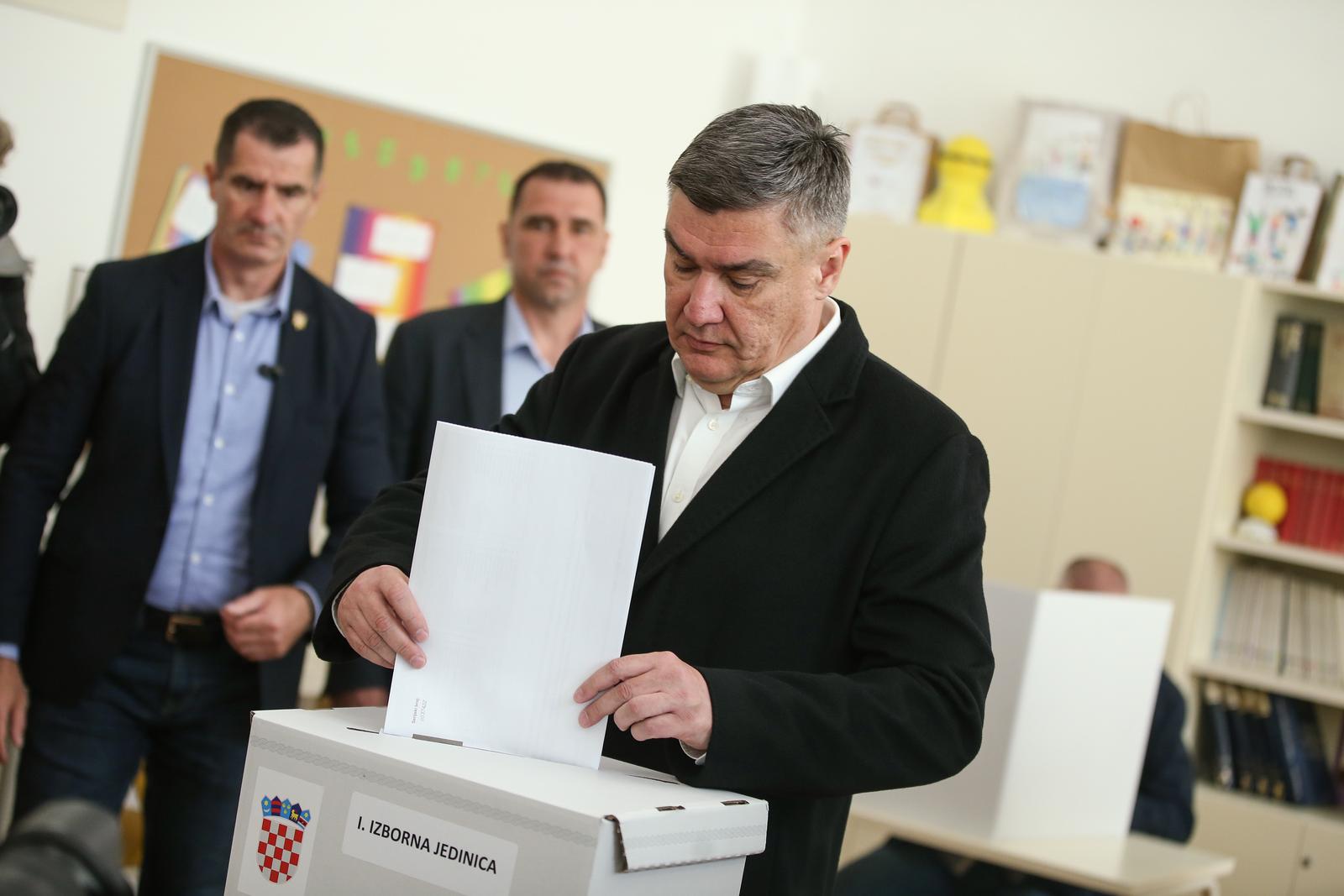 17.04.2024., Zagreb - Predsjednik Republike Hrvatske Zoran Milanovic u drustvu supruge Sanje Music Milanovic glasovao je na birackom mjestu u OS Petra Zrinskog u Krajiskoj ulici 9. Photo: Matija Habljak/PIXSELL