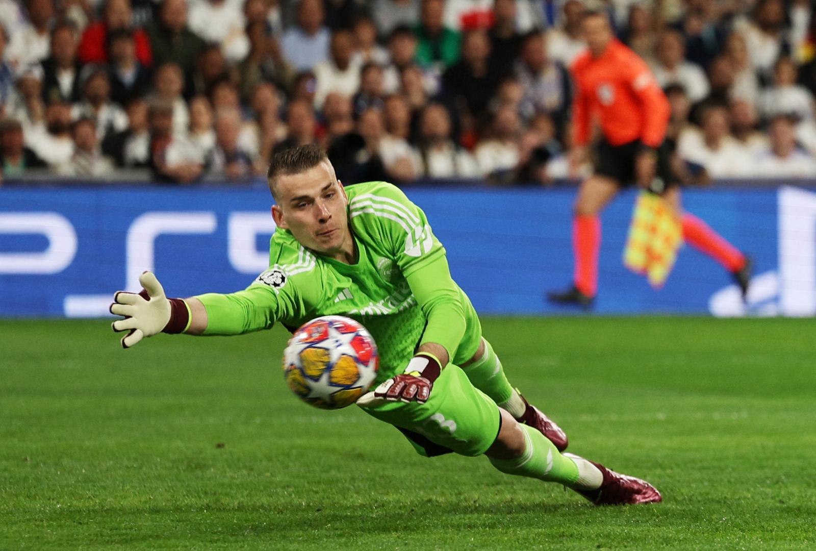 Soccer Football - Champions League - Quarter Final - First Leg - Real Madrid v Manchester City - Santiago Bernabeu, Madrid, Spain - April 9, 2024 Real Madrid's Andriy Lunin in action as Manchester City's Bernardo Silva scores their first goal REUTERS/Violeta Santos Moura Photo: VIOLETA SANTOS MOURA/REUTERS