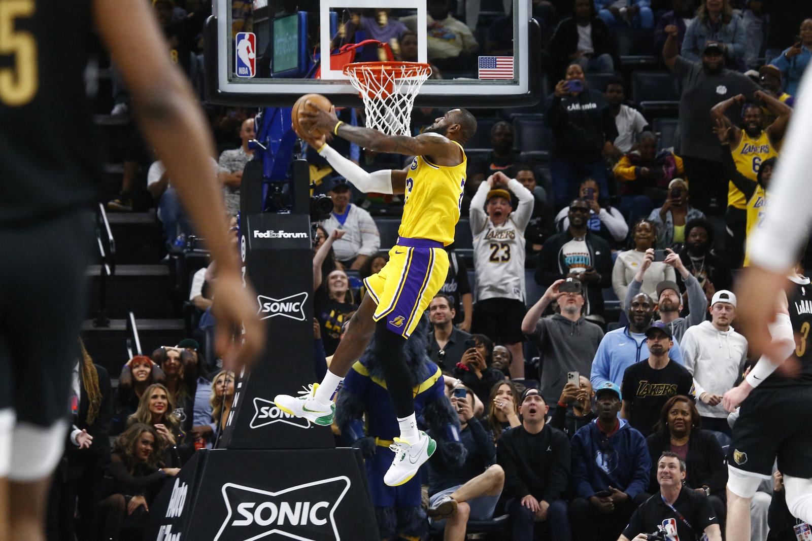 Apr 12, 2024; Memphis, Tennessee, USA; Los Angeles Lakers forward LeBron James (23) dunks during the second half against the Memphis Grizzlies at FedExForum. Mandatory Credit: Petre Thomas-USA TODAY Sports Photo: Petre Thomas/REUTERS