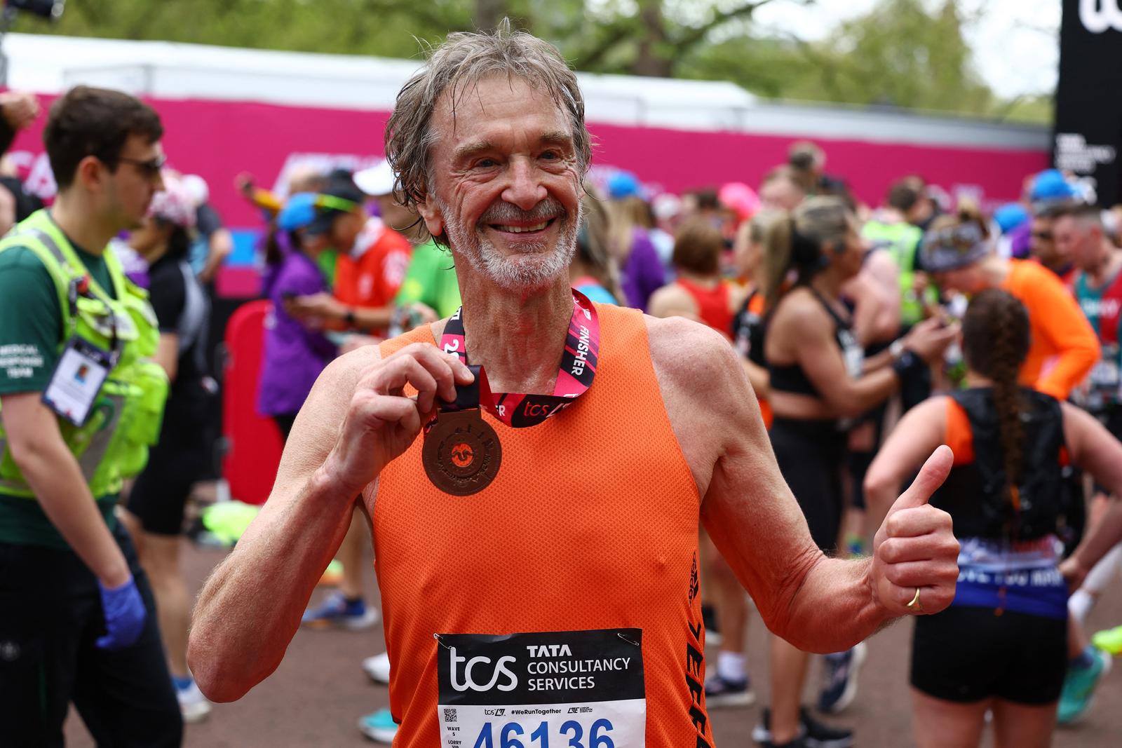Athletics - London Marathon - London, Britain - April 21, 2024  Manchester United co owner Jim Ratcliffe poses with his medal after finishing the marathon REUTERS/Matthew Childs Photo: Matthew Childs/REUTERS