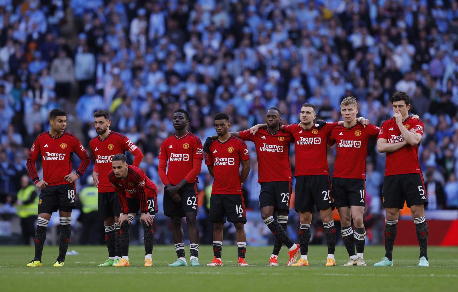 Soccer Football - FA Cup - Semi Final - Coventry City v Manchester United - Wembley Stadium, London, Britain - April 21, 2024  Manchester United players line up during the penalty shootout Action Images via Reuters/Andrew Couldridge Photo: Andrew Couldridge/REUTERS