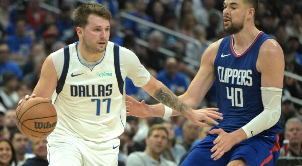 Apr 21, 2024; Los Angeles, California, USA; Dallas Mavericks guard Luka Doncic (77) is defended by Los Angeles Clippers center Ivica Zubac (40) in the second half of game one of the first round for the 2024 NBA playoffs at Crypto.com Arena. Mandatory Credit: Jayne Kamin-Oncea-USA TODAY Sports Photo: Jayne Kamin-Oncea/REUTERS