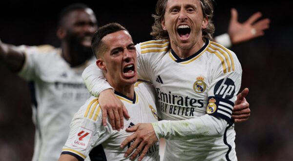 Soccer Football - LaLiga - Real Madrid v Sevilla - Santiago Bernabeu, Madrid, Spain - February 25, 2024  Real Madrid's Luka Modric celebrates scoring their first goal with Lucas Vazquez REUTERS/Violeta Santos Moura Photo: VIOLETA SANTOS MOURA/REUTERS