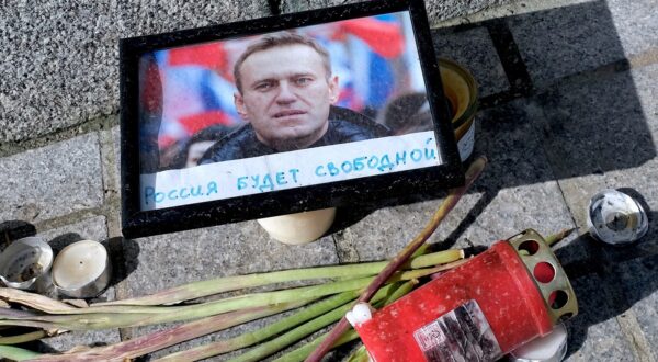 Tribute to Alexei Navalny at Place Kleber in Strasbourg. Flowers and candles are regularly laid in the city centre. April 10, 2024, Strasbourg Northeastern France.,Image: 864229297, License: Rights-managed, Restrictions: , Model Release: no, Credit line: Roses Nicolas/ABACA / Abaca Press / Profimedia