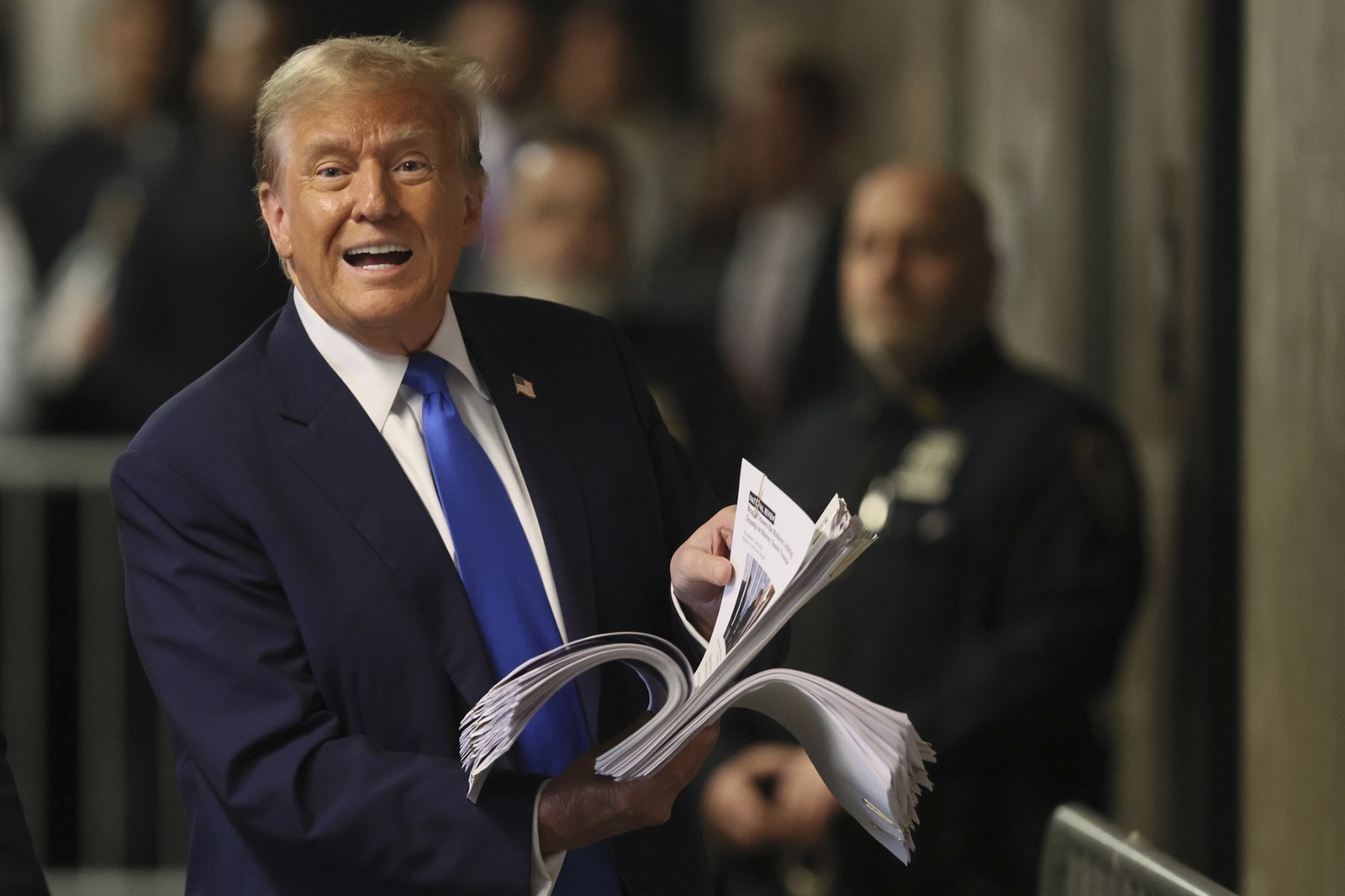 April 18, 2024; New York, New York; Former U.S. President Donald Trump speaks to the media, while holding news clippings, as his trial continues over charges that he falsified business records to conceal money paid to silence porn star Stormy Daniels in 2016, in Manhattan criminal court.,Image: 866028175, License: Rights-managed, Restrictions: *** World Rights ***, Model Release: no, Credit line: USA TODAY Network / ddp USA / Profimedia