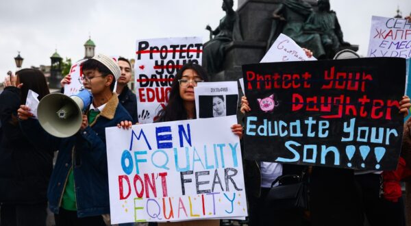 April 21, 2024, Krakow, Poland: Members of Kazakhstan diaspora and supporters hold banners while attending 'Justice for Saltanat' rally at the Main Square in Krakow, Poland on April 21st, 2024. The rally was held against domestic violence and the backdrop of the trial of Kuandyk Bishimbayev, former Minister of the National Economy of Kazakhstan who is accused of murdering his wife, Saltanat Nukenova in November 2023.,Image: 867080025, License: Rights-managed, Restrictions: , Model Release: no, Credit line: Beata Zawrzel / Zuma Press / Profimedia