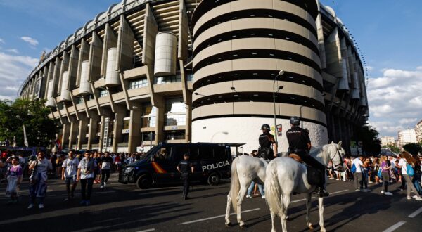 Horse mounted police patrol outside the Santiago Bernabeu stadium in Madrid on June 3, 2017 before the UEFA Champions League football match final Juventus vs Real Madrid CF held at the National Stadium of Wales in Cardiff.,Image: 334755608, License: Rights-managed, Restrictions: , Model Release: no, Credit line: OSCAR DEL POZO / AFP / Profimedia