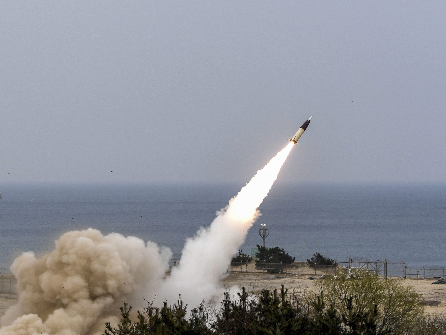 March 25, 2022, South Korea: March 24, 2022-East coast, South Korea-In this photo provided by South Korea Defense Ministry, South Korea's military launches Army Tactical Missile System or ATACMS, during a military exercise at an undisclosed location in South Korea, Thursday, March 24, 2022. North Korea test-fired possibly its biggest intercontinental ballistic missile toward the sea Thursday, according to its neighbors, raising the ante in a pressure campaign aimed at forcing the United States and other rivals to accept it as a nuclear power and remove crippling sanctions.,Image: 672872555, License: Rights-managed, Restrictions: , Model Release: no, Credit line: Defense Ministry / Zuma Press / Profimedia
