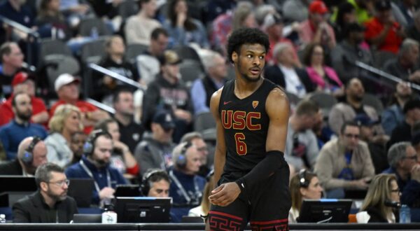 LAS VEGAS, NEVADA - MARCH 14: Bronny James #6 of the USC Trojans looks on in the second half of a quarterfinal game against the Arizona Wildcats during the Pac-12 Conference basketball tournament at T-Mobile Arena on March 14, 2024 in Las Vegas, Nevada. The Wildcats defeated the Trojans 70-49.   David Becker,Image: 857224337, License: Rights-managed, Restrictions: , Model Release: no, Credit line: David Becker / Getty images / Profimedia