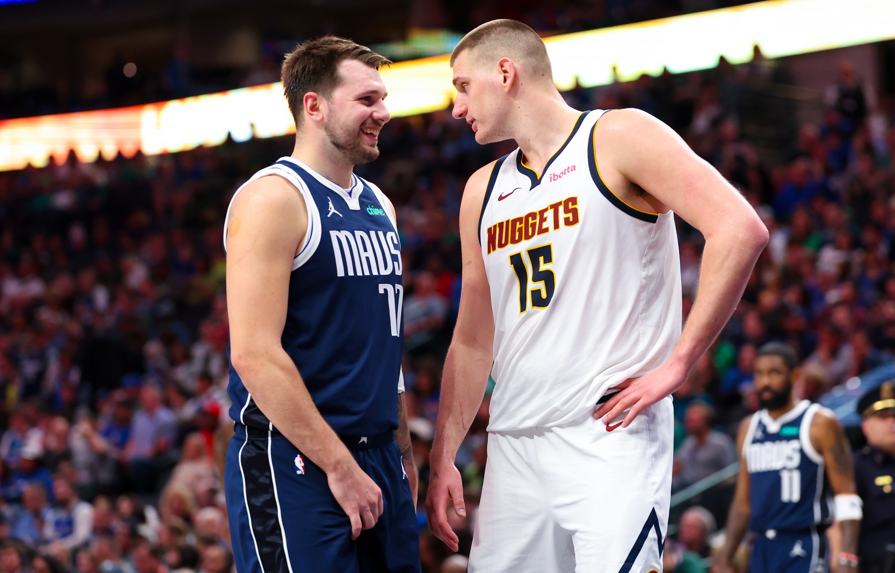 Mar 17, 2024; Dallas, Texas, USA;  Dallas Mavericks guard Luka Doncic (77) speaks with Denver Nuggets center Nikola Jokic (15) during the second half at American Airlines Center.,Image: 857649449, License: Rights-managed, Restrictions: , Model Release: no, Credit line: USA TODAY Sports / ddp USA / Profimedia