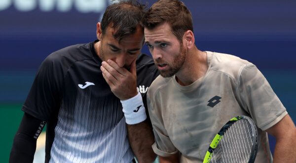 MIAMI GARDENS, FLORIDA - MARCH 30: Ivan Dodig of Croatia and Austin Krajicek of the United States talk before a serve against Rohan Bopanna of India and Matthew Ebden of Australia during the Men's Doubles Final at Hard Rock Stadium on March 30, 2024 in Miami Gardens, Florida.   Elsa,Image: 861277901, License: Rights-managed, Restrictions: , Model Release: no, Credit line: ELSA / Getty images / Profimedia