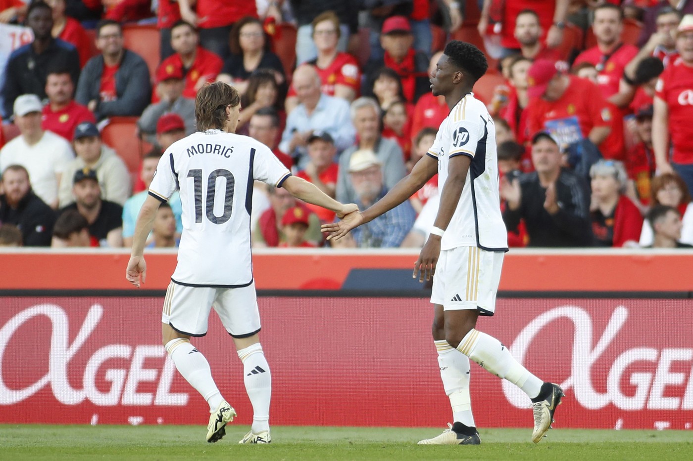 Real Madrid's French midfielder #18 Aurelien Tchouameni (R) celebrates scoring his team's first goal with Real Madrid's Croatian midfielder #10 Luka Modric during the Spanish league football match between RCD Mallorca and Real Madrid CF at the Mallorca Son Moix stadium in Palma de Mallorca on April 13, 2024.,Image: 864539894, License: Rights-managed, Restrictions: , Model Release: no, Credit line: JAIME REINA / AFP / Profimedia