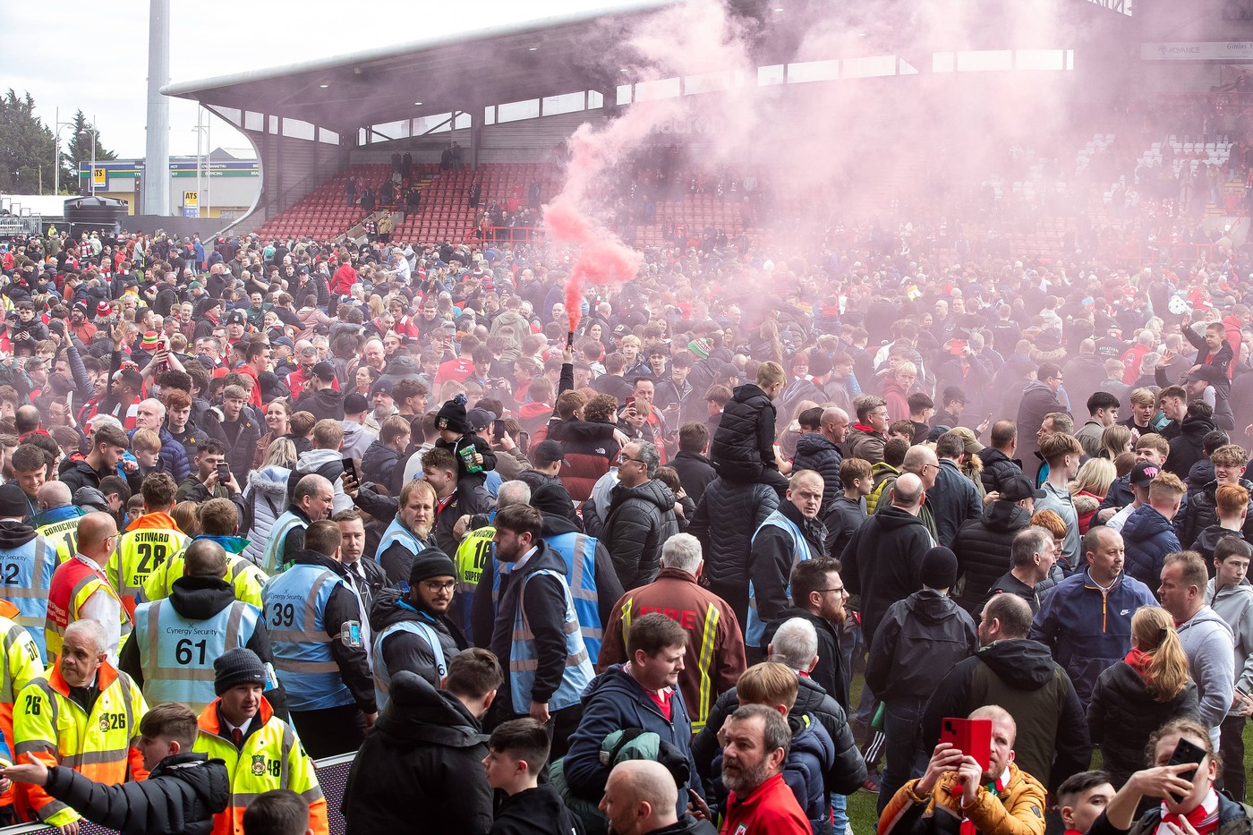 Wrexham FC v Forest Green Rovers EFL Sky Bet League 2 13/04/2024. Wrexham fans celebrate promotion to League 1 during the EFL Sky Bet League 2 match between Wrexham FC and Forest Green Rovers at the Racecourse Ground, Wrexham, United Kingdom on 13 April 2024. Wrexham Racecourse Ground Wales United Kingdom Editorial use only DataCo restrictions apply See www.football-dataco.com , Copyright: xManjitxNarotrax PSI-19458-0072,Image: 864665621, License: Rights-managed, Restrictions: Credit images as "Profimedia/ IMAGO", Model Release: no, Credit line: Manjit Narotra / imago sportfotodienst / Profimedia
