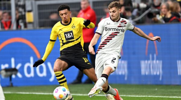 4/21/2024 - DORTMUND - (l-r) Jadon Sancho of Borussia Dortmund, Josip Stanisic of Bayer 04 Leverkusen during the Bundesliga match between Borussia Dortmund and Bayer 04 Leverkusen at Signal Iduna Park on April 21, 2024 in Dortmund, Germany. ANP | Hollandse Hoogte | GERRIT VAN COLOGNE /ANP/Sipa USA,Image: 866733167, License: Rights-managed, Restrictions: *** World Rights Except Belgium, France, Germany, The Netherlands, and the UK ***  BELOUT DEUOUT FRAOUT GBROUT NLDOUT, Model Release: no, Credit line: ANP / ddp USA / Profimedia