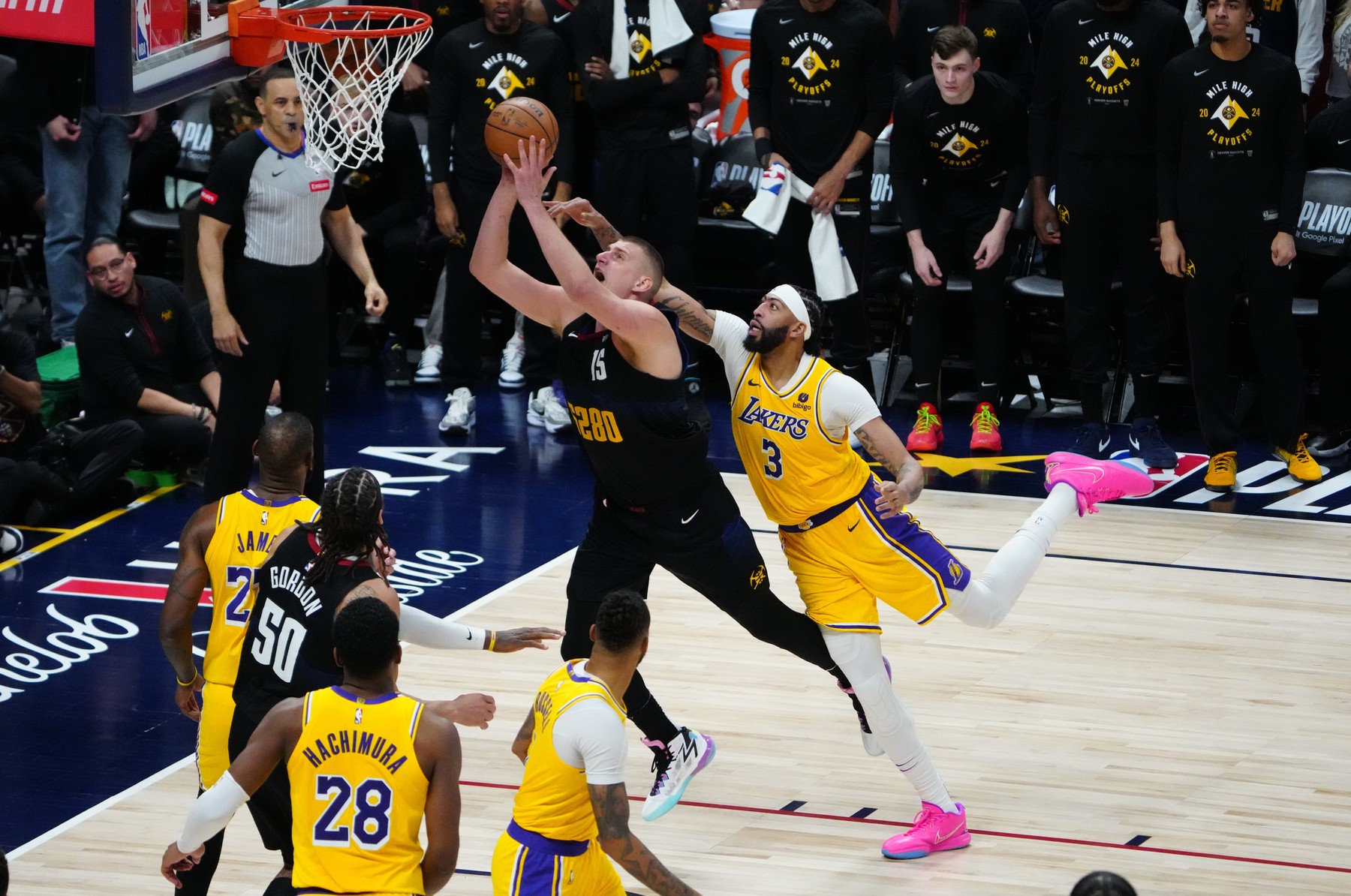 Apr 22, 2024; Denver, Colorado, USA; Los Angeles Lakers forward Anthony Davis (3) fouls Denver Nuggets center Nikola Jokic (15)) in the fourth quarter during game two during the 2024 NBA playoffs at Ball Arena.,Image: 867172553, License: Rights-managed, Restrictions: , Model Release: no, Credit line: USA TODAY Sports / ddp USA / Profimedia