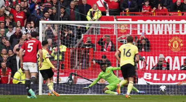 Burnley's Zeki Amdouni scores their side's first goal of the game from a penalty during the Premier League match at Old Trafford, Manchester. Picture date: Saturday April 27, 2024.,Image: 868401092, License: Rights-managed, Restrictions: EDITORIAL USE ONLY No use with unauthorised audio, video, data, fixture lists, club/league logos or "live" services. Online in-match use limited to 120 images, no video emulation. No use in betting, games or single club/league/player publications., Model Release: no, Credit line: Martin Rickett / PA Images / Profimedia