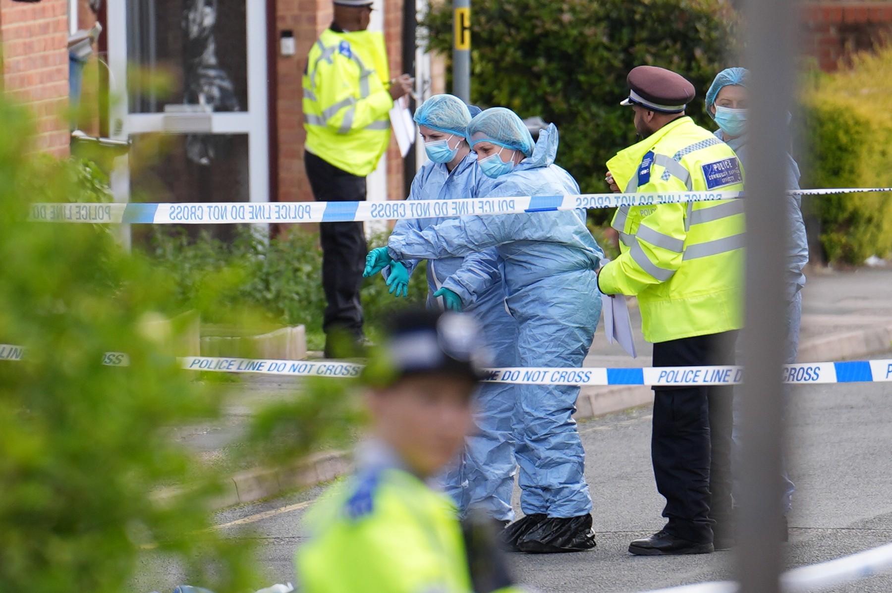 Forensic investigators in Laing Close in Hainault, north east London, after a 13-year-old boy died after being stabbed and a sword-wielding man arrested following an attack on members of the public and two police officers. Picture date: Tuesday April 30, 2024.,Image: 869120762, License: Rights-managed, Restrictions: , Model Release: no, Credit line: Jordan Pettitt / PA Images / Profimedia