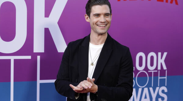 David Corenswet poses at the premiere of the Netflix film "Look Both Ways," Tuesday, Aug. 16, 2022, at the Tudum Theater in Los Angeles. (AP Photo/Chris Pizzello)