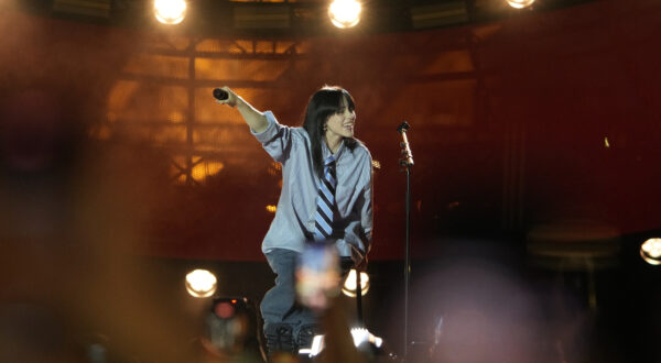 File - Billie Eilish performs during the Power Our Planet concert in Paris on June 22, 2023. Universal Music Group, which represents artists including Taylor Swift, Drake, Adele, Bad Bunny and Eilish, says that it will no longer allow its music on TikTok now that a licensing deal between the two parties has expired. (AP Photo/Lewis Joly, File)