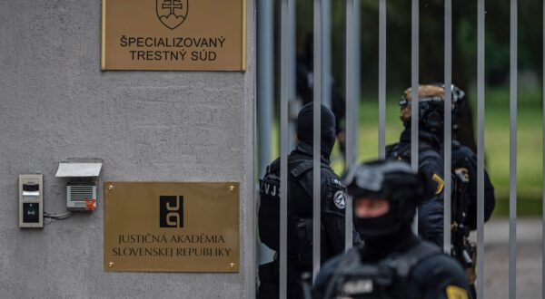 epa11349660 Police takes up position as they await the arrival of shooting suspect Juraj C., charged with the attempted murder with premeditation of Slovak Prime Minister Robert Fico, for an interrogation at the Specialized Criminal Court in Pezinok, Slovakia, 18 May 2024. Slovak Prime Minister Robert Fico was shot and injured in Handlova on 15 May and transported to a hospital in a life-threatening condition; the shooting suspect was arrested on spot. The prosecutor requests custodial prosecution of Juraj C.  EPA/JAKUB GAVLAK
