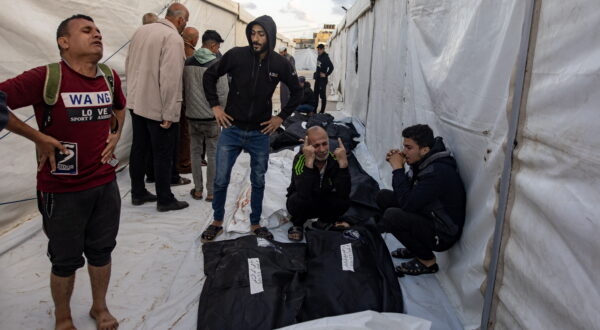 epa11323761 Relatives of Palestinians who were killed during overnight Israeli air strikes on the Rafah refugee camp react next to their wrapped bodies outside the Rafah Field Hospital in Rafah, southern Gaza Strip, 07 May 2024. The Israel Defence Forces (IDF) said on 07 May that its ground troops began an operation targeting Hamas militants and infrastructure within specific areas of eastern Rafah, taking operational control of the Gazan side of the Rafah crossing based on intelligence information. More than 34,600 Palestinians and over 1,455 Israelis have been killed, according to the Palestinian Health Ministry and the IDF, since Hamas militants launched an attack against Israel from the Gaza Strip on 07 October 2023, and the Israeli operations in Gaza and the West Bank which followed it.  EPA/HAITHAM IMAD
