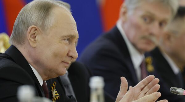 epa11329277 Russia's President Vladimir Putin (L) attends a meeting with Laos' President Thongloun Sisoulith (not pictured) in Moscow, Russia, 09 May 2024.  EPA/MAXIM SHEMETOV / POOL
