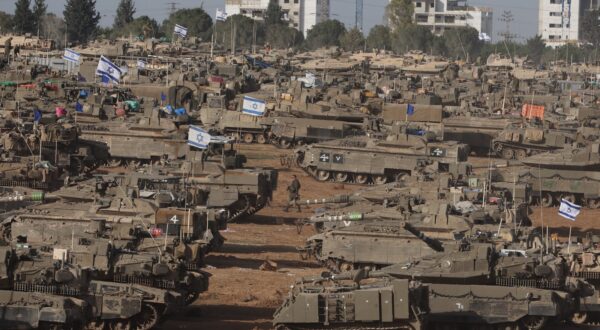 epa11329410 Israeli military vehicles gathered near the border fence with the Gaza Strip, at an undisclosed location in southern Israel, 09 May 2024. On 07 May, Israel said that its troops began an operation targeting Hamas militants and infrastructure within specific areas of eastern Rafah, taking operational control of the Gazan side of the Rafah crossing. The United States on 08 May confirmed the decision to pause a shipment of 'high payload munitions' to Israel. More than 34,900 Palestinians and over 1,455 Israelis have been killed, according to the Palestinian Health Ministry and the Israel Defense Forces (IDF), since Hamas militants launched an attack against Israel from the Gaza Strip on 07 October 2023, and the Israeli operations in Gaza and the West Bank which followed it.  EPA/ABIR SULTAN