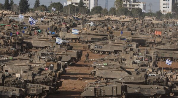epa11329410 Israeli military vehicles gathered near the border fence with the Gaza Strip, at an undisclosed location in southern Israel, 09 May 2024. On 07 May, Israel said that its troops began an operation targeting Hamas militants and infrastructure within specific areas of eastern Rafah, taking operational control of the Gazan side of the Rafah crossing. The United States on 08 May confirmed the decision to pause a shipment of 'high payload munitions' to Israel. More than 34,900 Palestinians and over 1,455 Israelis have been killed, according to the Palestinian Health Ministry and the Israel Defense Forces (IDF), since Hamas militants launched an attack against Israel from the Gaza Strip on 07 October 2023, and the Israeli operations in Gaza and the West Bank which followed it.  EPA/ABIR SULTAN